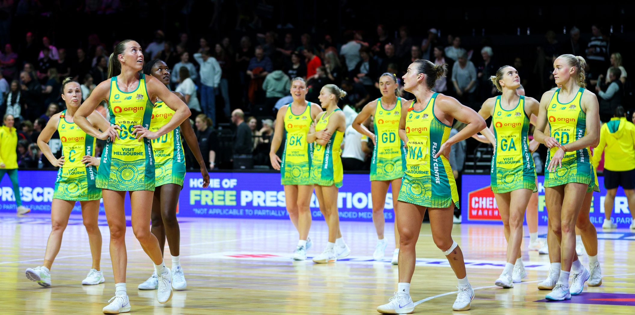 The Diamonds players leave the court after their loss to New Zealand.